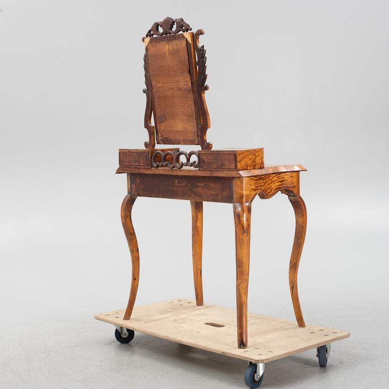 A Rococo revival dressing table, later part of the 19th Century.