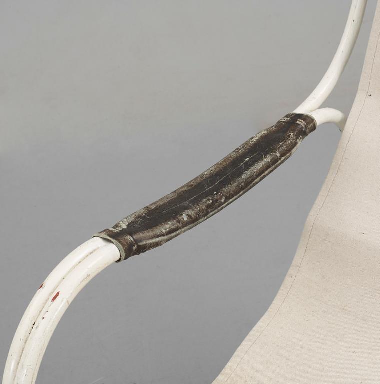 A Gustaf Isak Claesson lacquered metall and canvas easy chair, ca 1930.