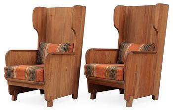 416. A pair of Axel-Einar Hjorth 'Lovö' pine armchairs by NK, 1930's.