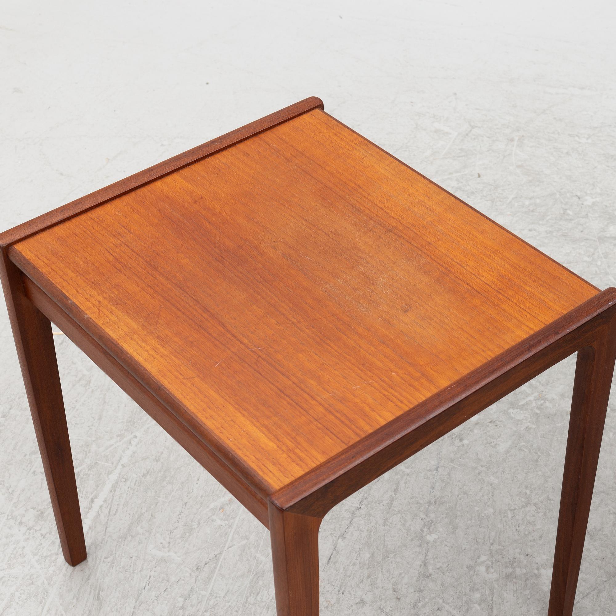 A teak coffee table and two side tables, Scandinavia, 1960's/70's.
