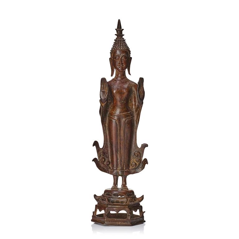 A standing sculpture of buddha, Laos, 18th Century.