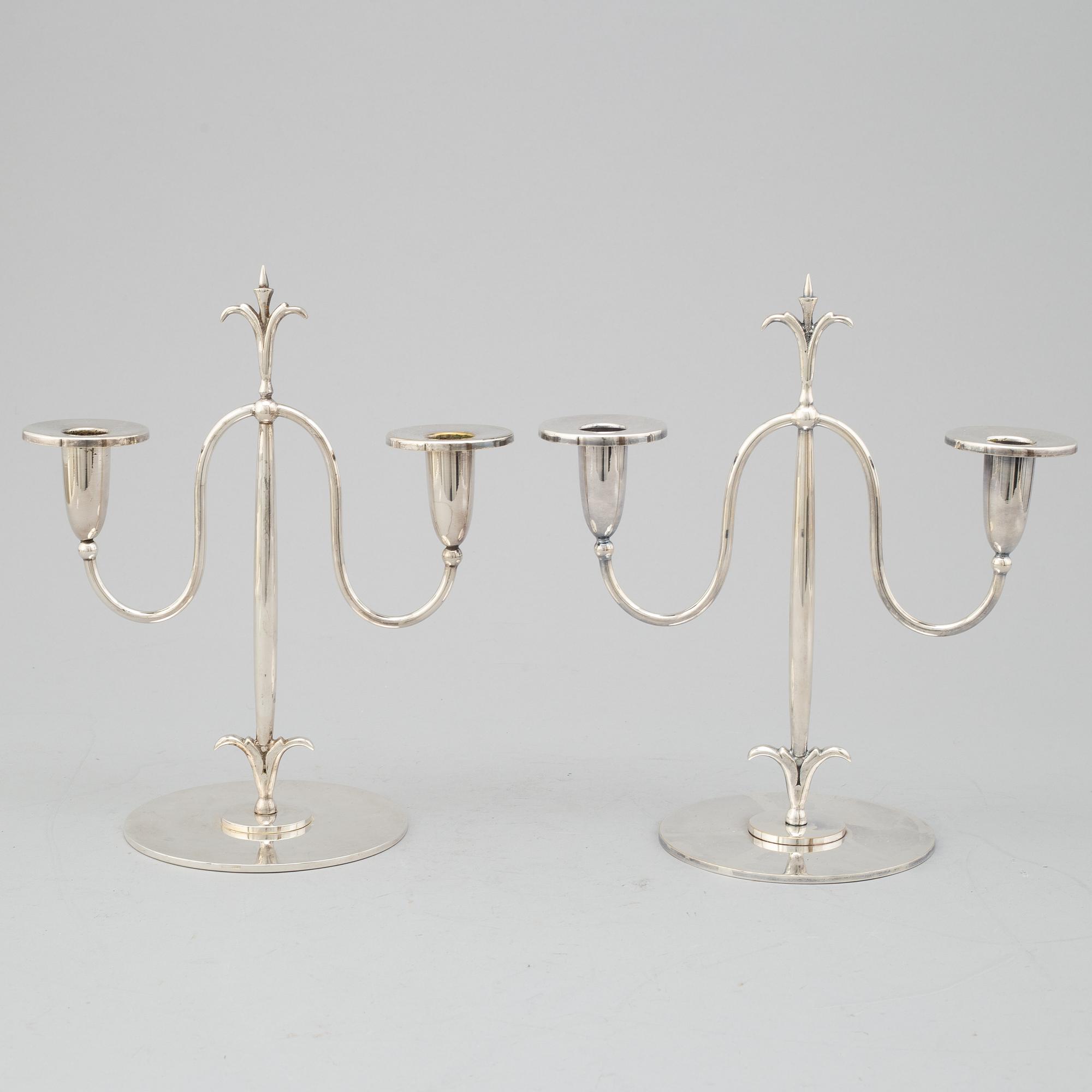 a pair of Elis Bergh silver plated candelabras, Swedish grace, CG Hallberg, Stockholm, 1920s.