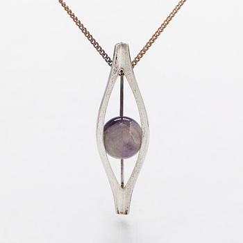 Elis Kauppi, a silver pendant, with amethyst quartz. Kupittaan Kulta, Turku 1961. With chain.