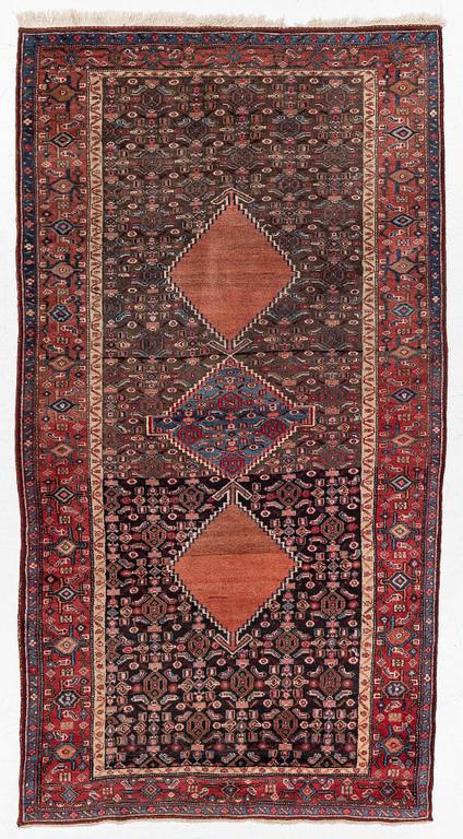 A semi-antique Bidjar rug, c. 255 x 135 cm.