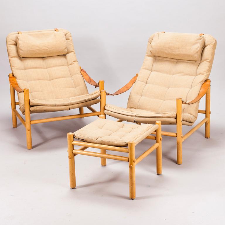 BROR BOIJE, A pair of 'Junker' easy chairs and an ottoman for Dux, Sweden, latter half of the 20th Century.
