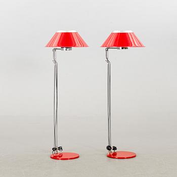 A pair of Anders Pehrson floor lamps.