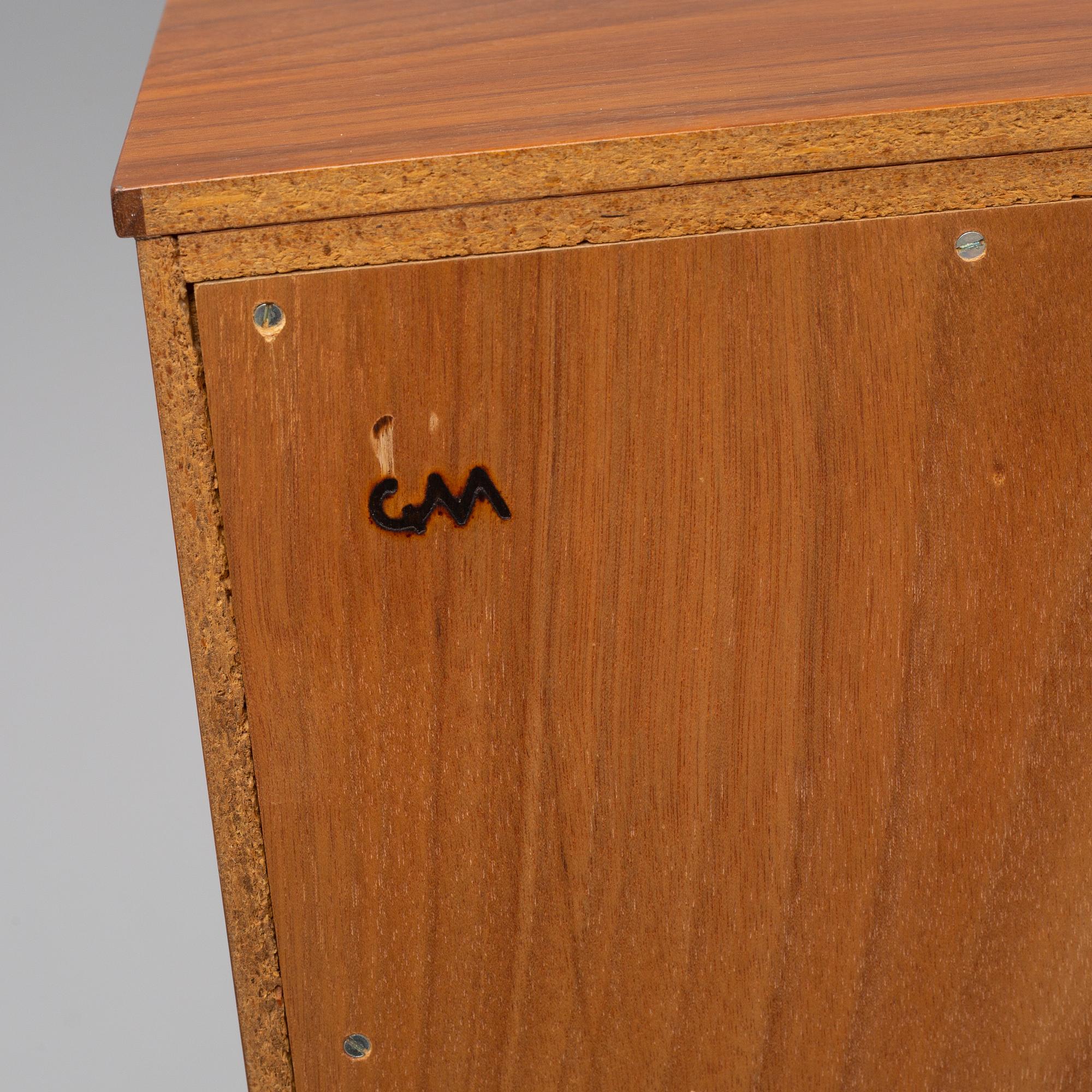 CARL MALMSTEN, a mahogany bookshelf.