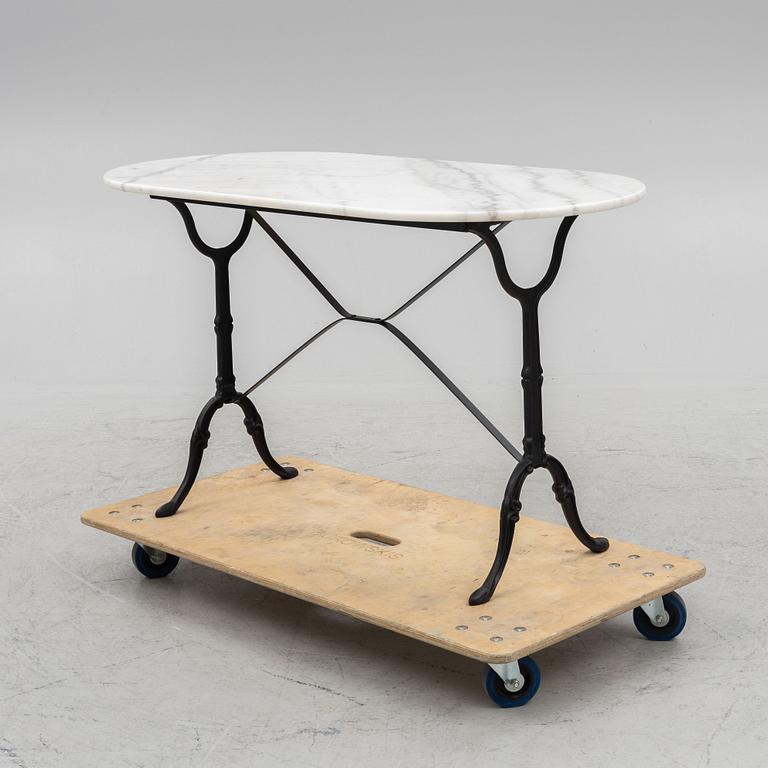 A marble and wrought iron table, Kare Design, 21st century.