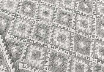A carpet, kilim, ca 390 x 298 cm.