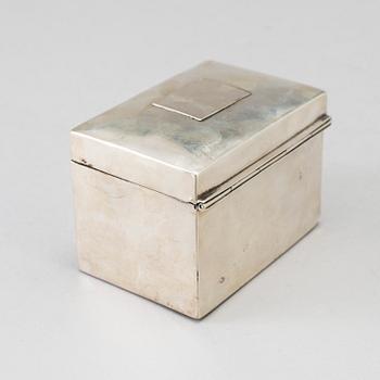 A silver calculator by Tiffany's and cuff link box in silver H.V.P & Co Birmingham 1887.