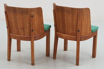 A set of four chairs and two armchairs by Axel Einar Hjorth, Nordiska Kompaniet, Stockholm 1930's.