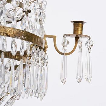 A late-Gustavian five-light gilt brass and cut glass chandelier, Stockholm, circa 1800.