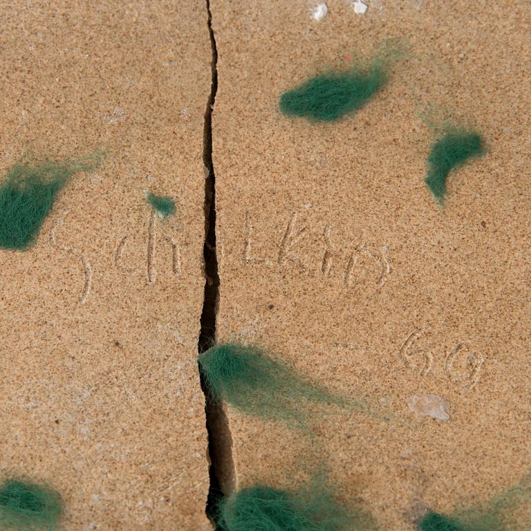 A signed stoneware sculpture.