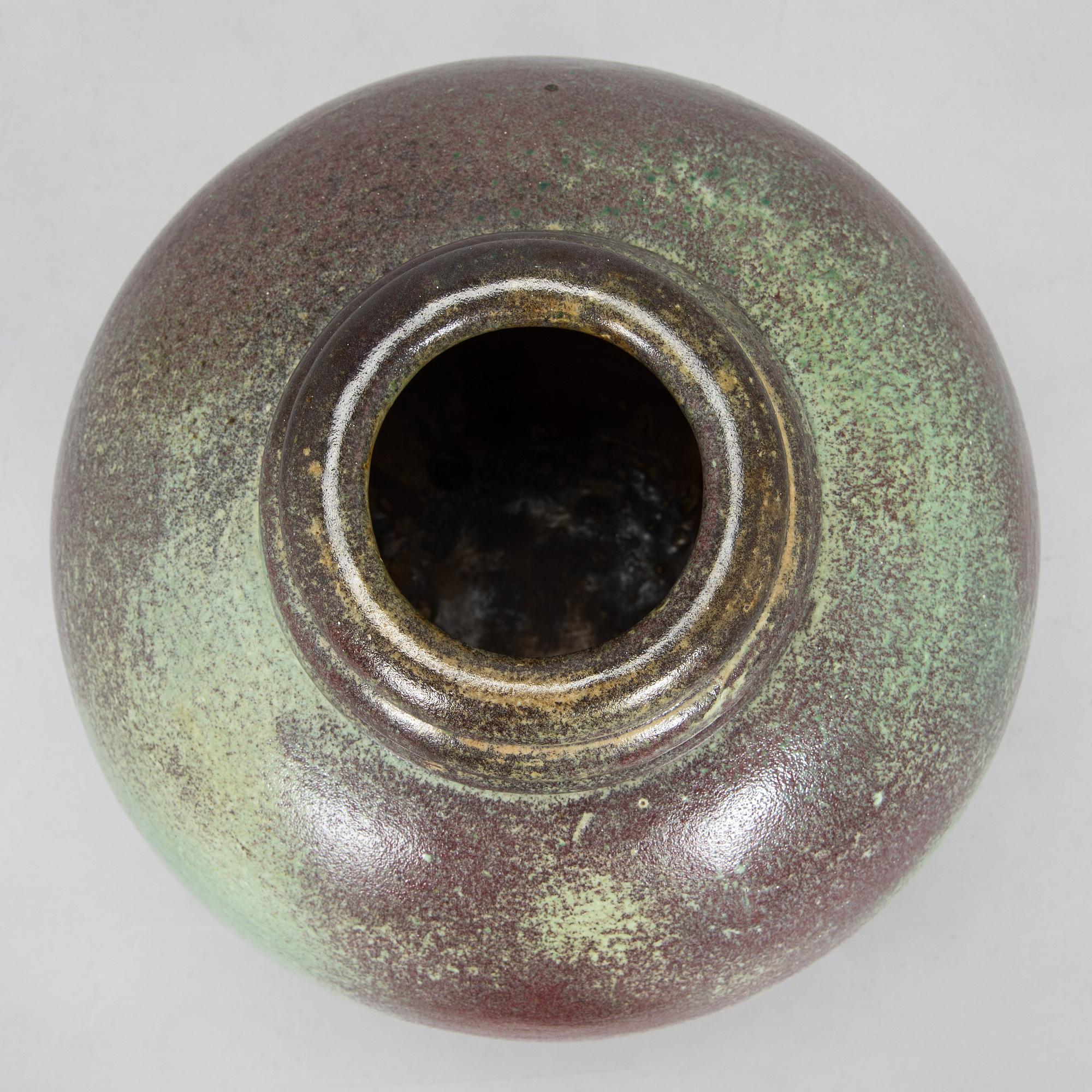 Heidi Blomstedt, a red clay floor vase, signed and dated -36.