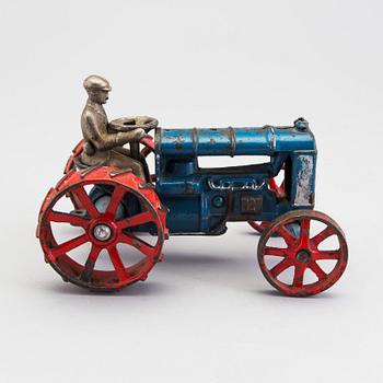 A cast iron tractor by Skoglund & Olsson, Sweden, ca 1930.