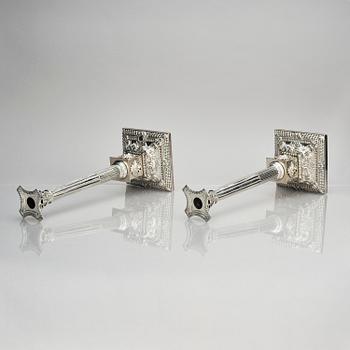 A pair of 18th century silver candlesticks, marks of Ebenezer Coker, London , possibly 1765.