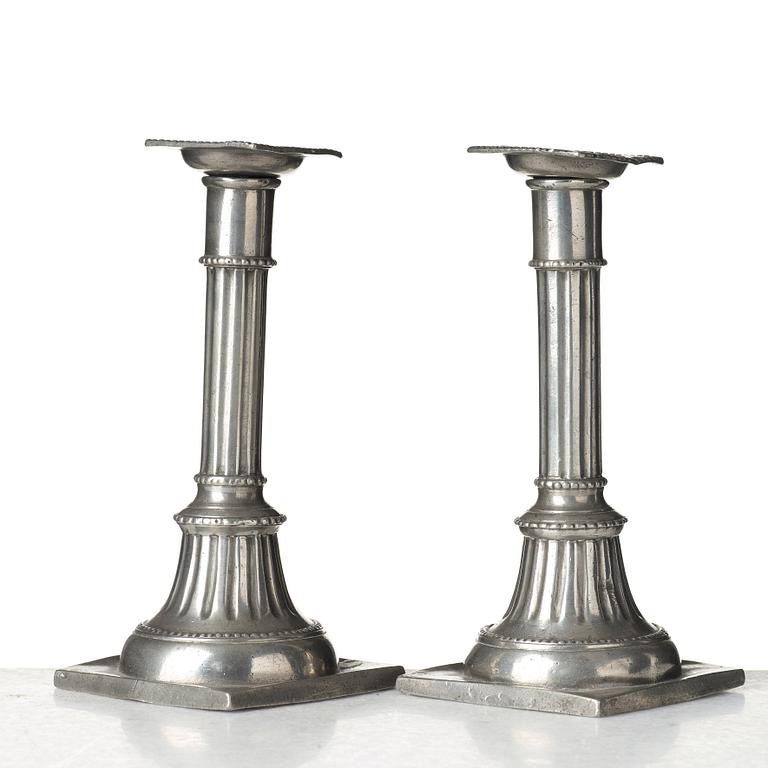 A pair of late Gustavian pewter candelsticks by Daniel Rising, Åbo 1797.