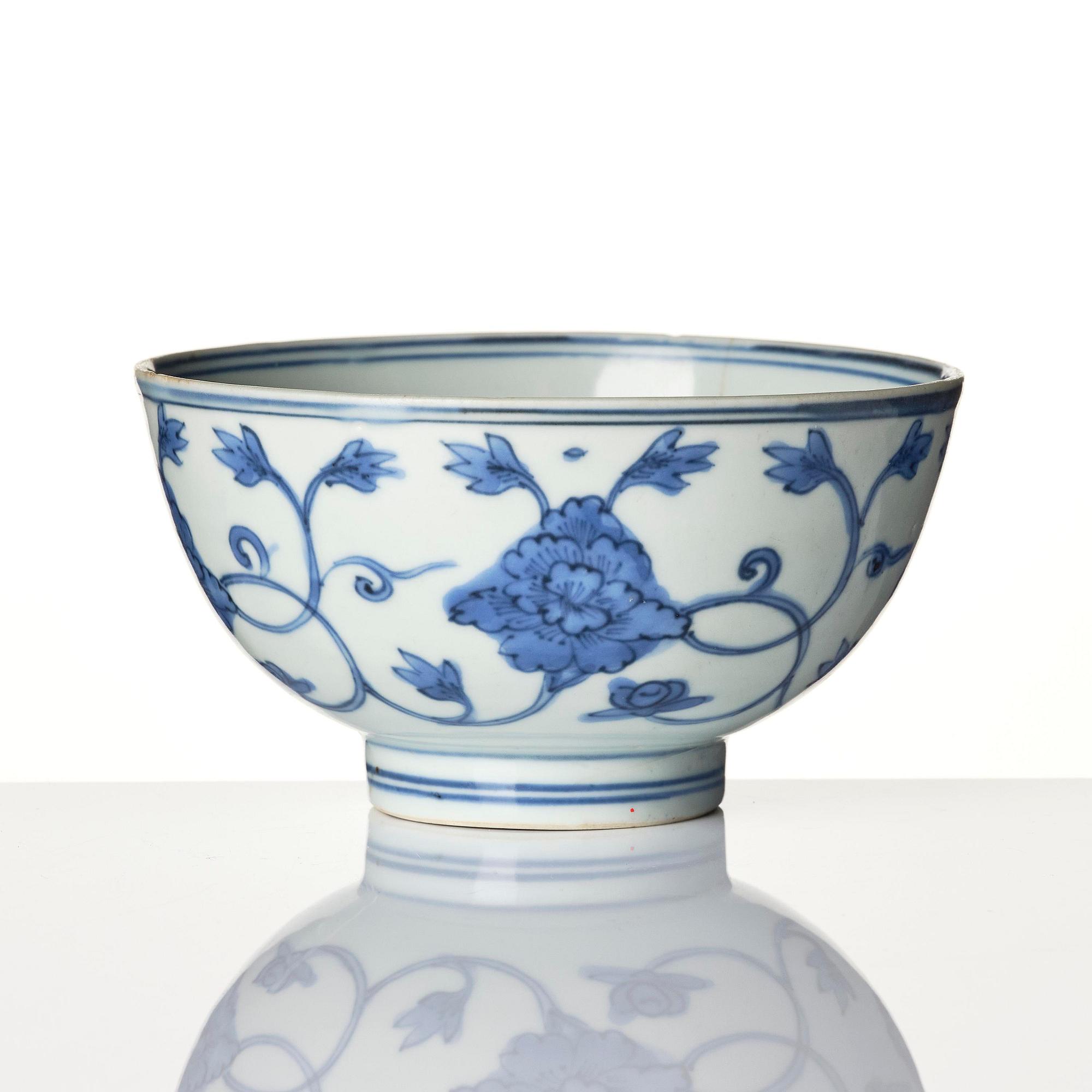 A blue and white 'floral' bowl and a dish, Ming dynasty, Jiajing (1522-1566).