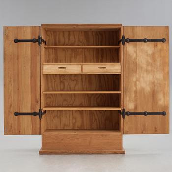 Axel Einar Hjorth, a "Lovö" stained pine cabinet, Nordiska Kompaniet, Sweden, 1930's.