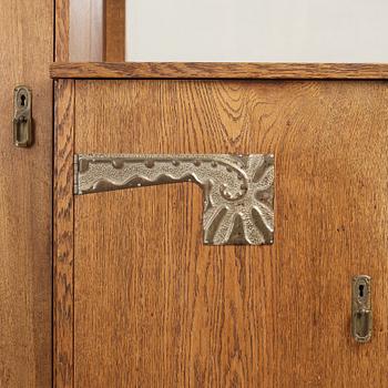 An Art Nouveau oak cabinet, Finland, ca 1900.