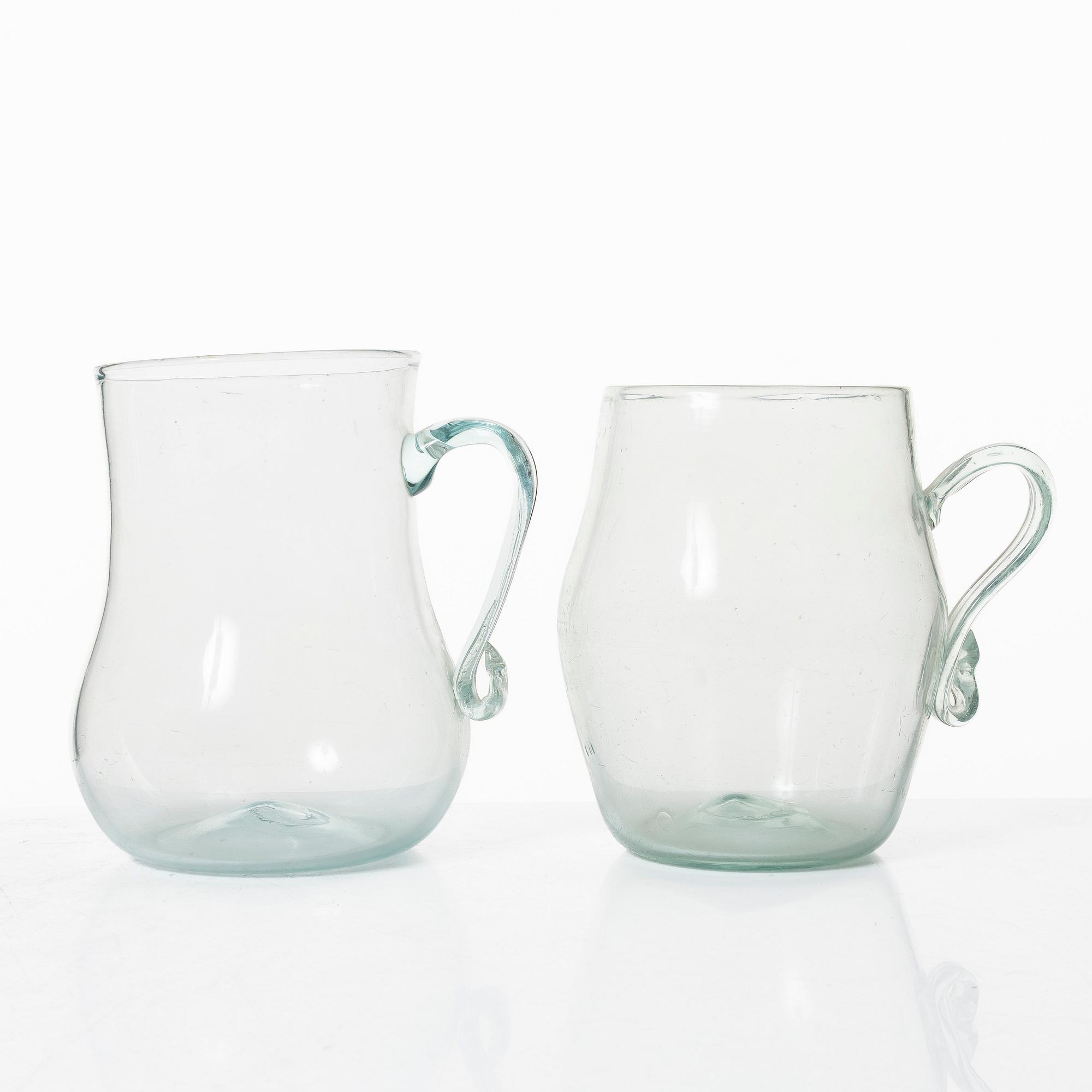 A set of two Swedish glass tankards, early 19th century.