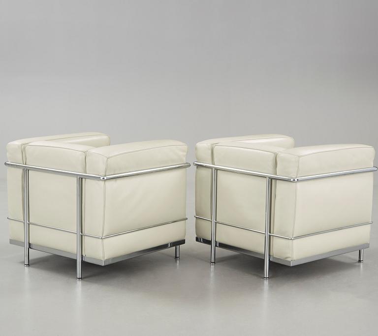 A pair of 'LC2' easy chairs designed by Le Corbusier, Cassina.