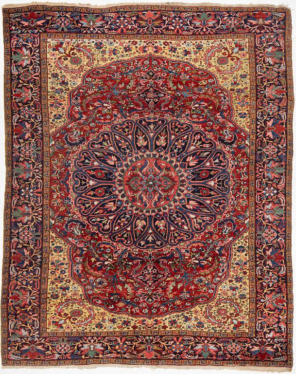 A semi-antique Ahar carpet, c 335 x 275 cm.