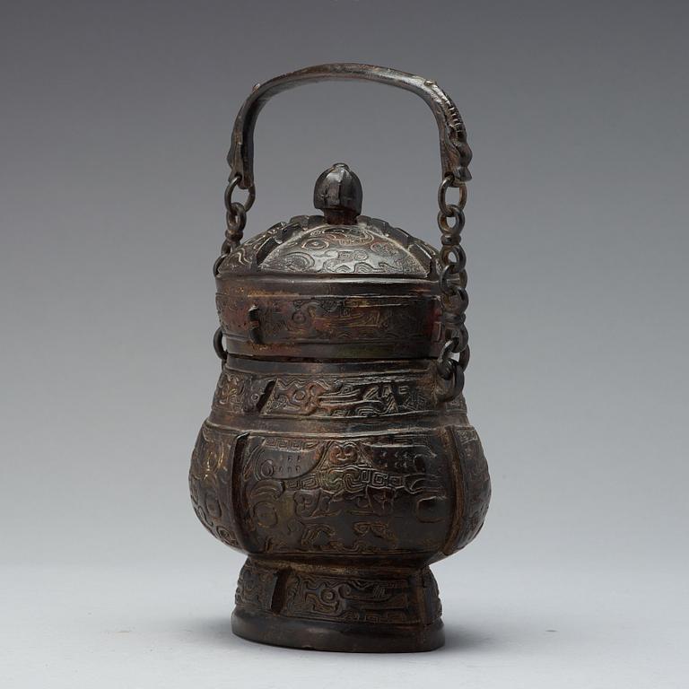 An archaistic bronze vessel of You shape, Ming dynasty or older.