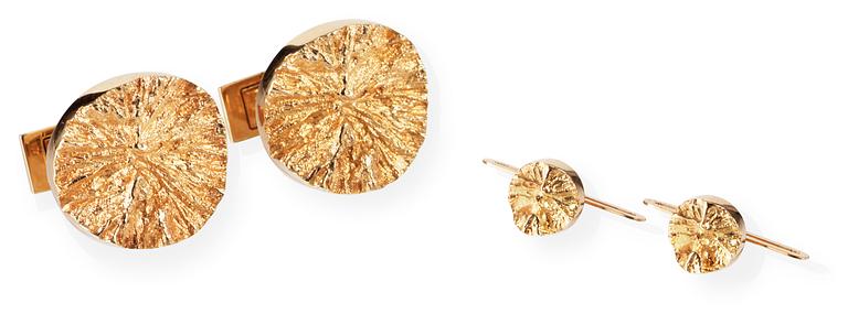 A pair of Björn Wecksreöm 18 k gold cufflinks and shirt buttons 'Devil's Wheels' by Lapponia, Finland.