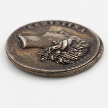 A coin commemorating Christina of Sweden's coronation 1650, by Erich Parise (medal engraver, fl. mid 17th century).