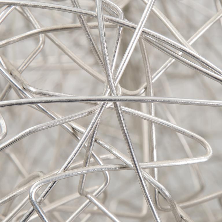 A 'Fil de Fer Ovale' ceiling light by Enzo Cattelini.