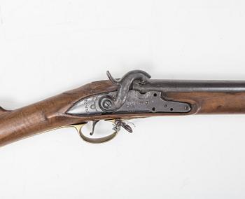 A 18th Century Swedish-British converted percussion gun.