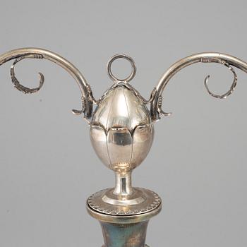 EO LYSTER, a silver candelabra. Århus, Denmark, dated 1812.