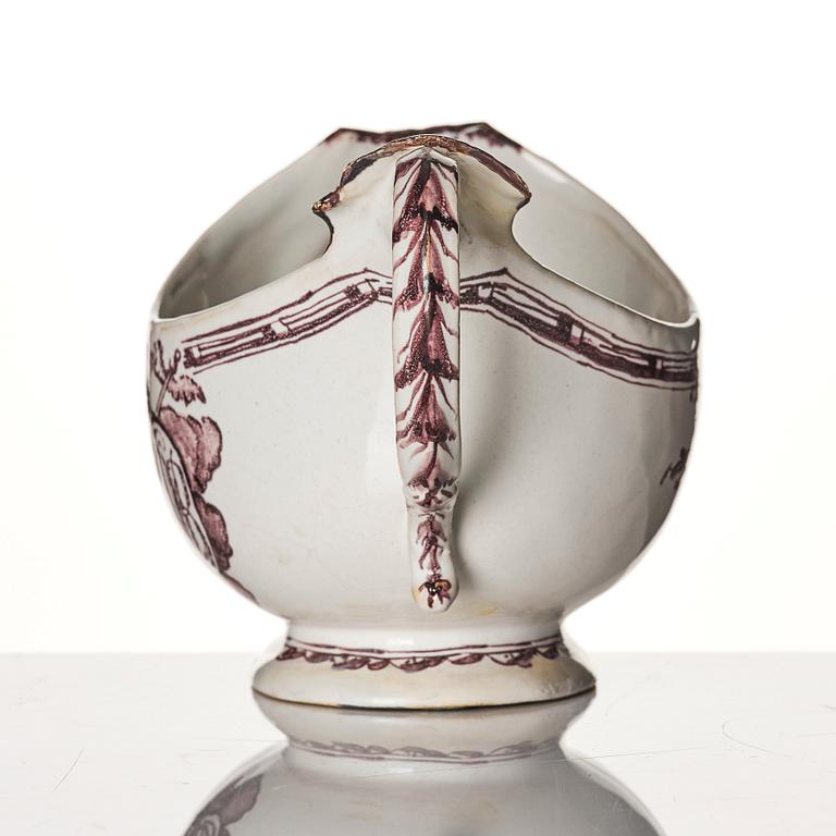 A Swedish Rörstrand faience sauce boat/creamer, 18th Century.