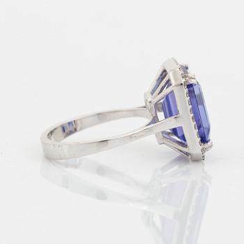 Emerald cut tanzanite and brilliant cut diamond cocktail ring.