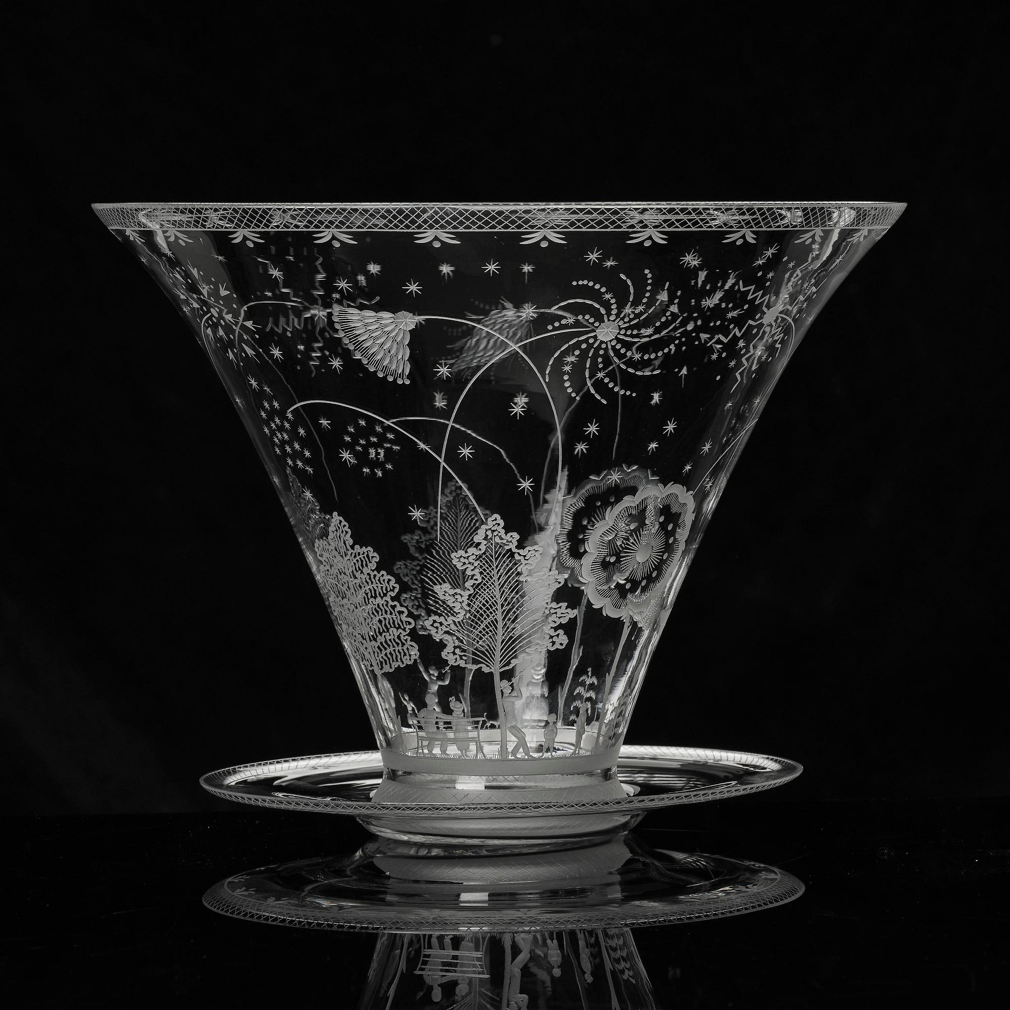 Edward Hald, a Swedish Grace "Fyrverkeri" (Fireworks) engraved glass bowl with a plate, Orrefors, Sweden, 1925, model 248.