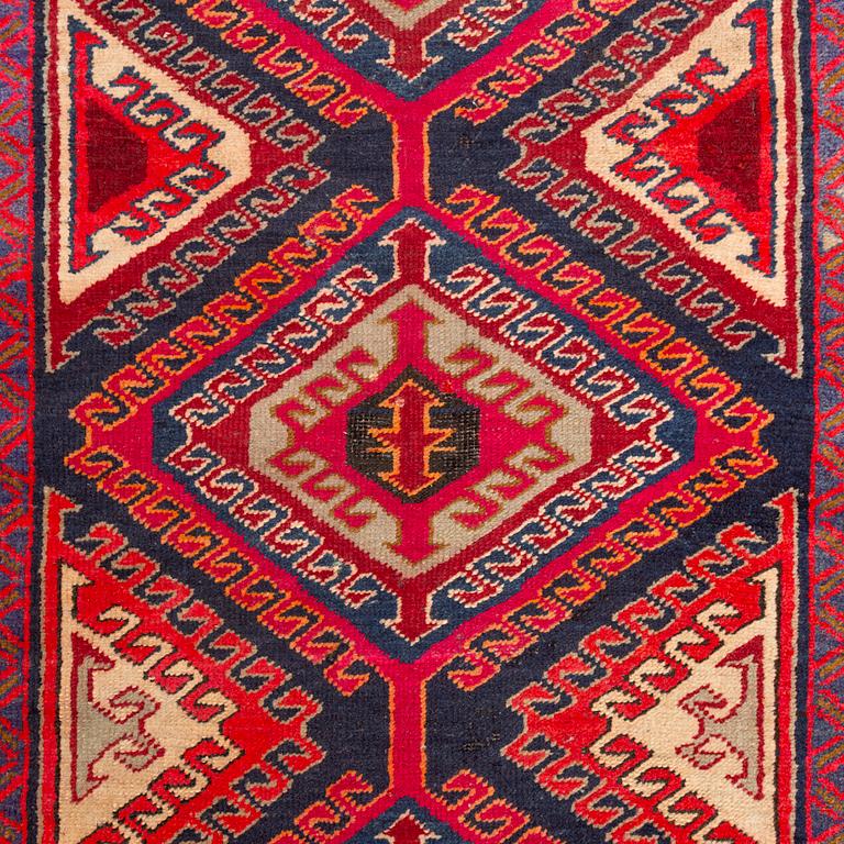 A semi-antique Meshkin runner, c. 356 x 123 cm.