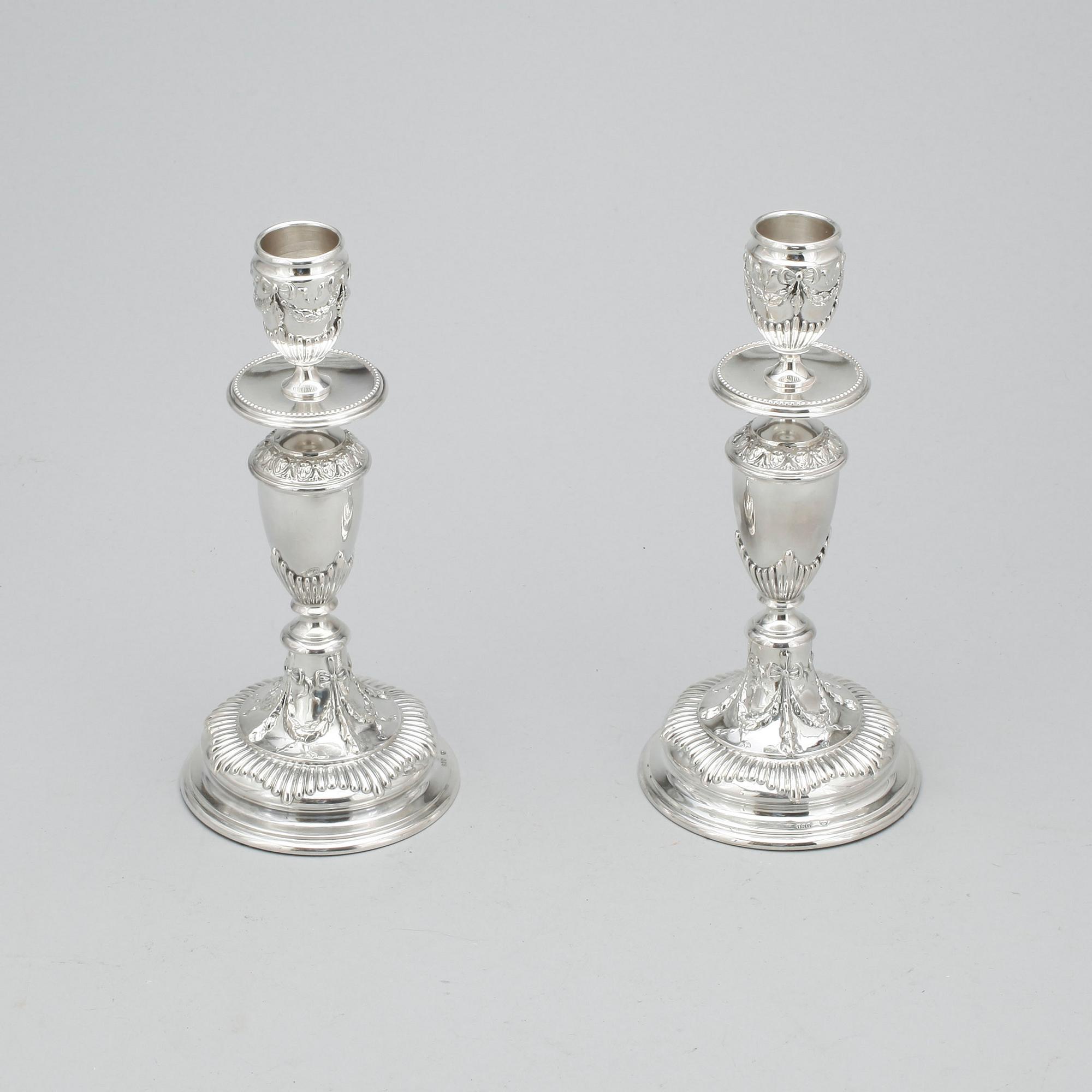 LJUSSTAKAR, ett par, silver, 1900-tal.