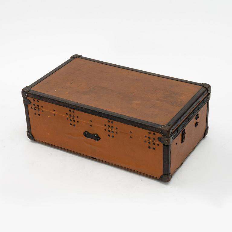 Louis Vuitton, orange Steem Trunk from the early 20th century.