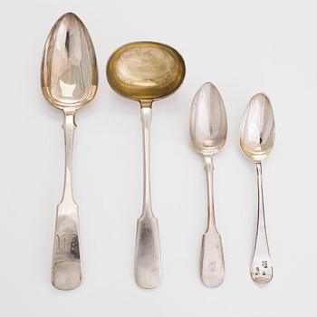 A silver soup ladle, serving spoon, and two tablespoons, St. Petersburg and Moscow 1801 - 1872.