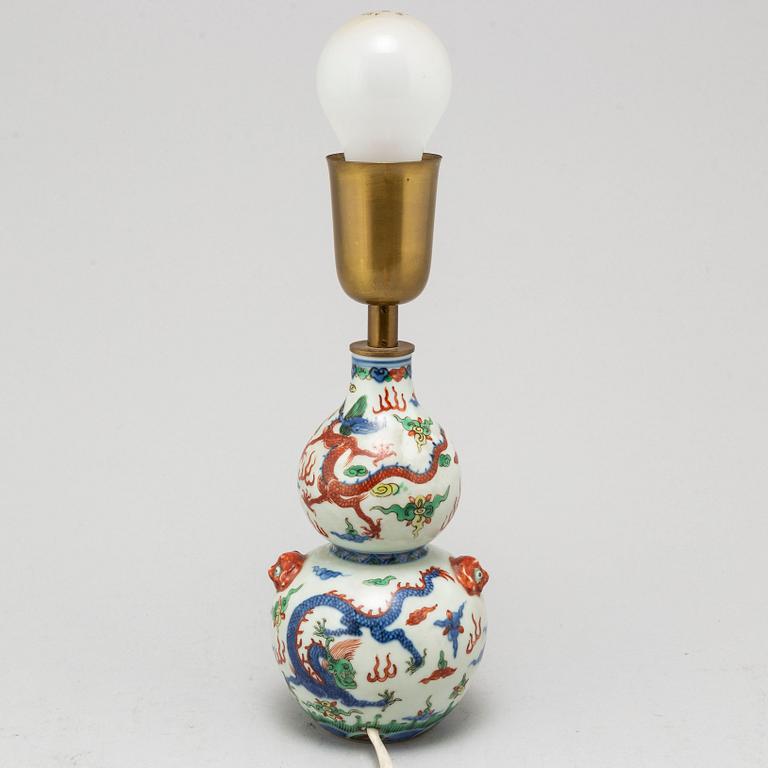 A Chinese porcelain wucai double gourd vase, turned into a table lamp, 20th century.