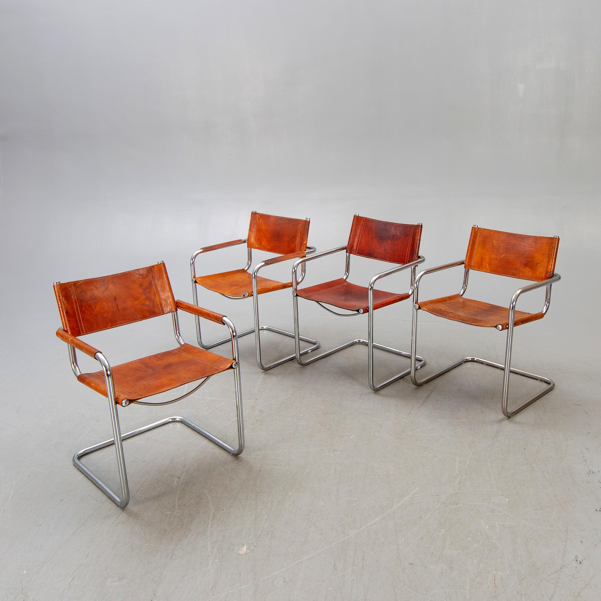 4 late 20th century Italian armchairs.