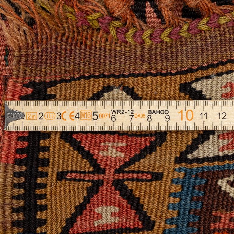 An antique kilim, southeastern Anatolia/Caucasus, c. 398 x 176 cm.