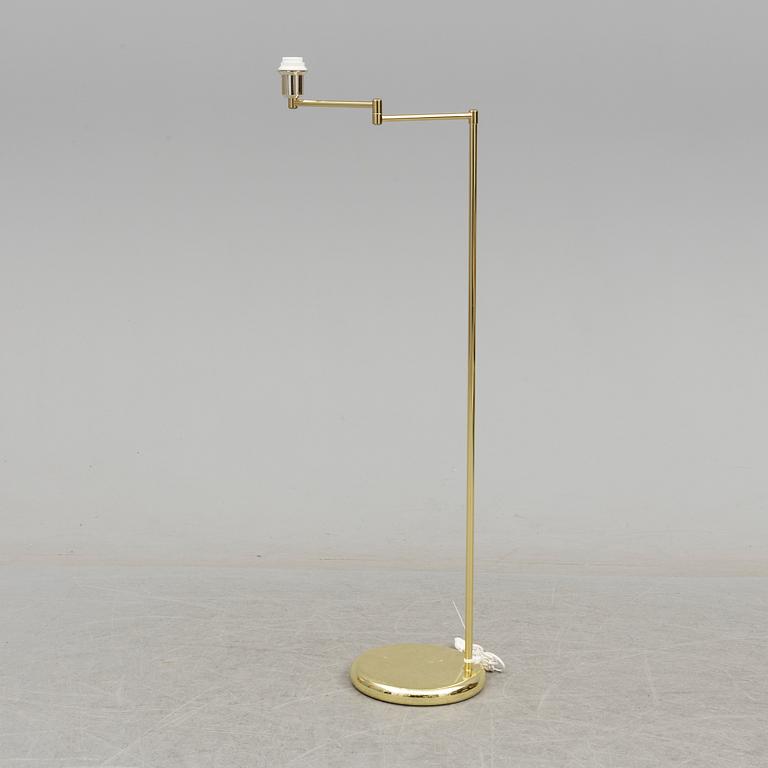 An end of the 20th century floor lamp with adjustable arm.