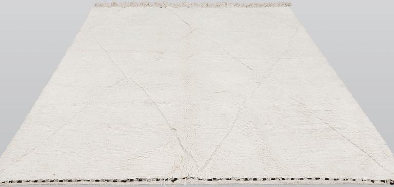A Moroccan rug, c 240 x 210 cm.