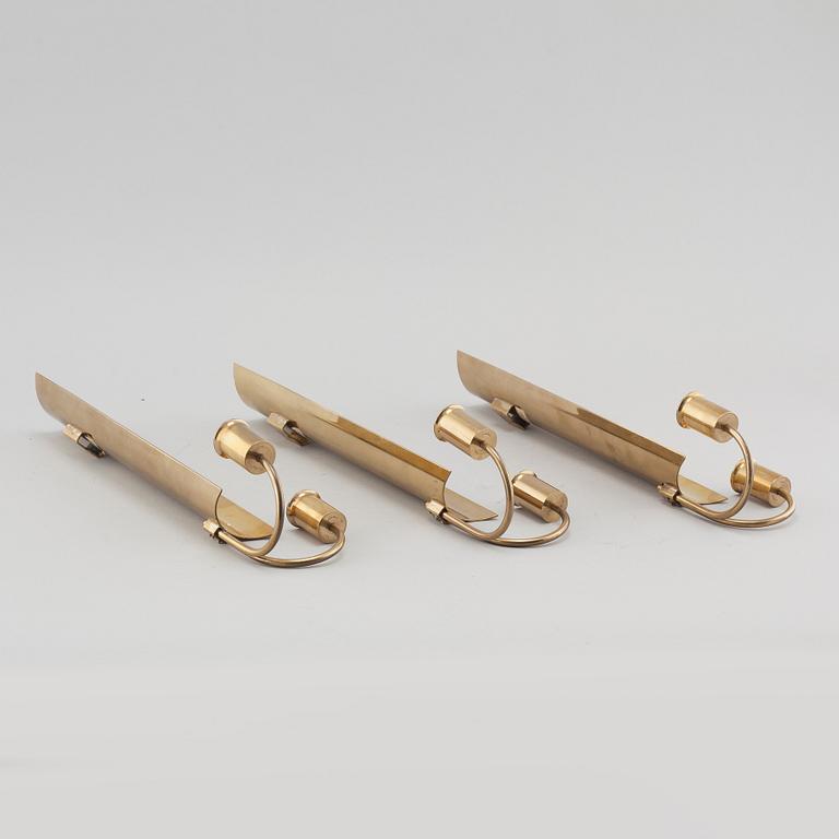 Three wall candle holders from Skultuna, model "Reflex", second half of the 20th century.