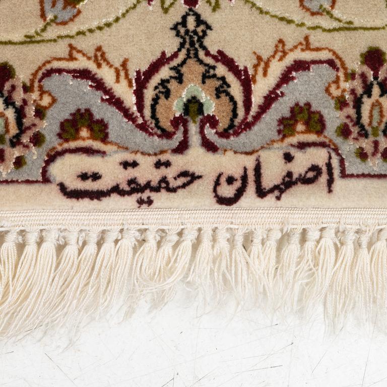 An Isfahan part silk rug, c. 161 x 110 cm.