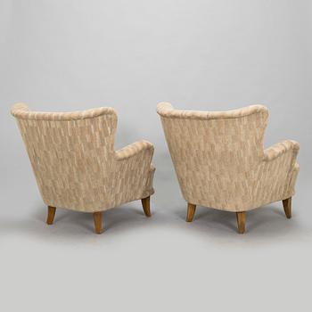 Ilmari Lappalainen, a pair of 1950's 'Laila' armchairs for Asko, Finland.