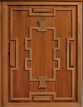 A Swedish Grace mahogany showcase cabinet, reportedly a win at the Stockholm Cabinetmaker's association lottery, 1920's.