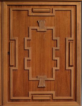 A Swedish Grace mahogany showcase cabinet, reportedly a win at the Stockholm Cabinetmaker's association lottery, 1920's.